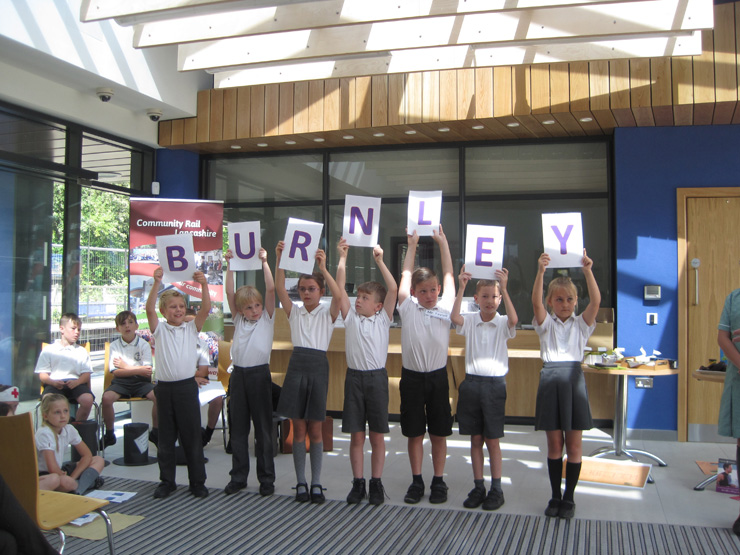 Burnley school children welcome European partners in style